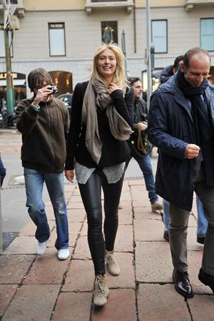 Maria Sharapova Giorgio and Roberta Armani meet tennis star Maria Sharapova at Armani's palace. November 30, 2012 