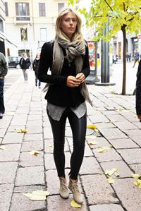 Maria Sharapova Giorgio and Roberta Armani meet tennis star Maria Sharapova at Armani's palace. November 30, 2012 