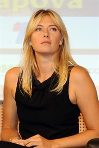 Maria Sharapova attends a press conference to present Saturday's exhibition match Milan November 30, 2012 