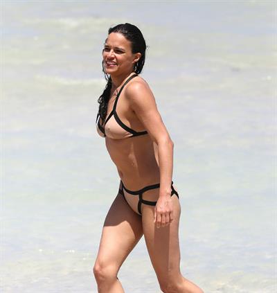 Michelle Rodriguez Bikini Pictures Michelle Rodriguez enjoying the sun at Miami Beach April 26-2013