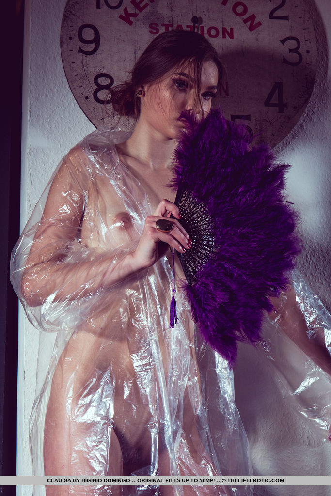 Claudia wraps her sexy, tight body on plastic as she plays with her pussy.