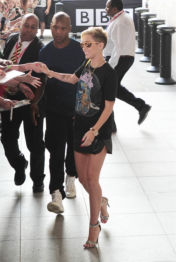 Miley Cyrus Spotted in a Join A Weird Trip T-shirt outside the London Studios in London (18.07.2013) 