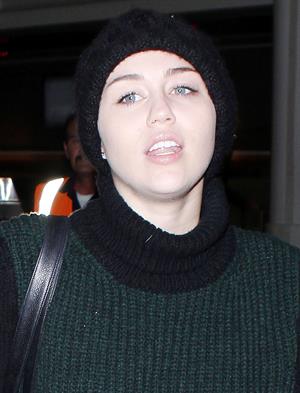 Miley Cyrus LAX airport 11/20/12 