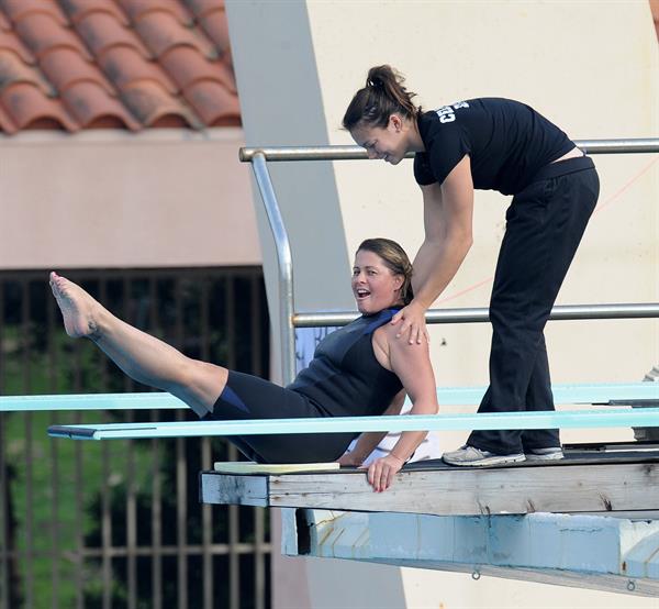 Nicole Eggert prepares for 'Splash' (sports bra/wetsuit) 6.2.2013 