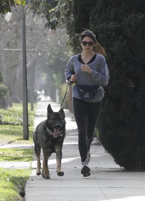 Nikki Reed jogging with her dog Enzo in Los Angeles on February 6, 2013