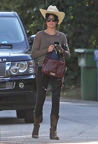 Nikki Reed walking and wearing her cowboy hat in Los Angeles on February 21, 2013