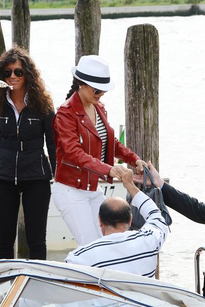 Salma Hayek - Touches down with her husband Francois-Henri Pinault at Marco Polo Airport in Venice (28.05.2013) 