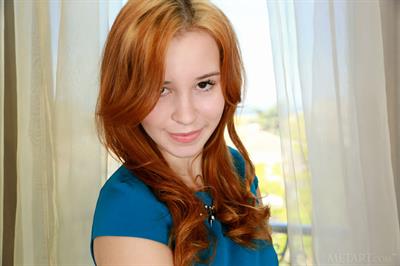 Redhead Gabriela Lea takes off her blue dress