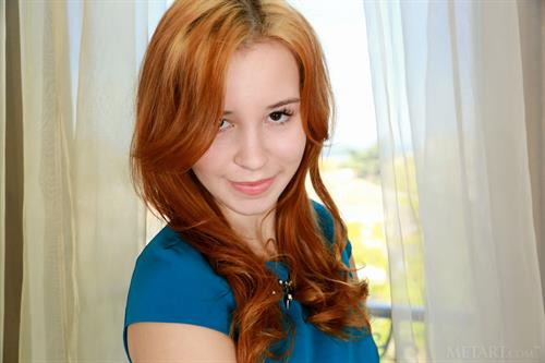 Redhead Gabriela Lea takes off her blue dress