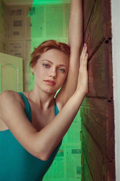 Sexy redhead Shirley Tate shows off her pussy