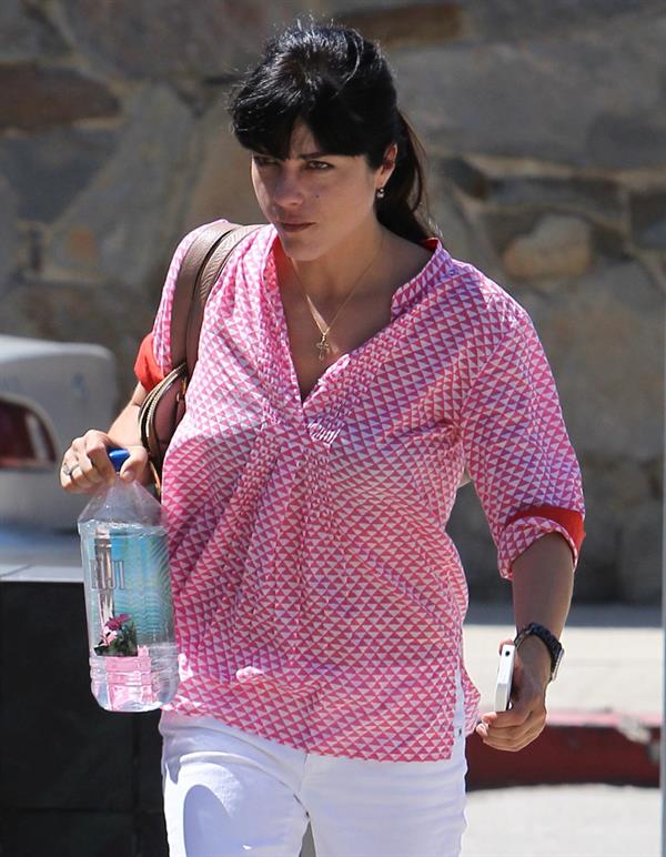 Selma Blair in red and white in Beverly Hills August 24, 2012