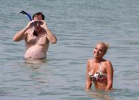 Tulisa Contostavlos in a bikini on the beach in Honolulu July 31, 2012