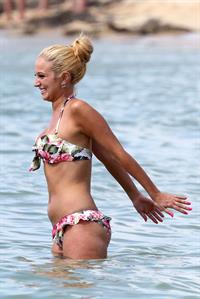 Tulisa Contostavlos in a bikini on the beach in Honolulu July 31, 2012