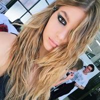 Camila Morrone taking a selfie