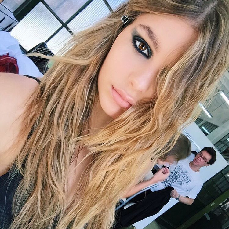 Camila Morrone taking a selfie