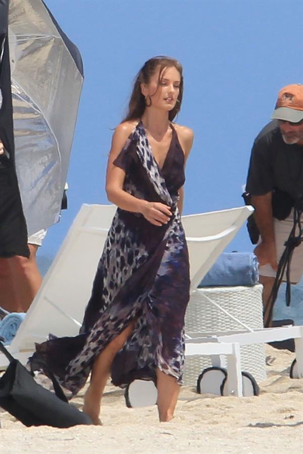 Minka Kelly on the set of Charlie's Angels on a beach in Miami 02-09-2011
