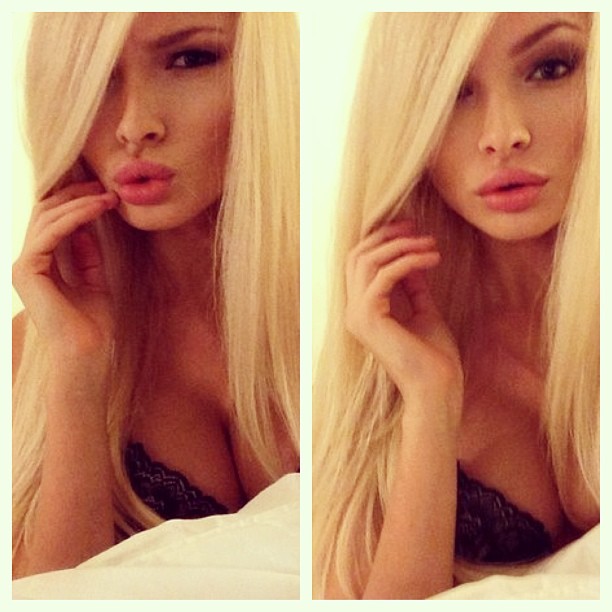 Aljona Shiskova in lingerie taking a selfie