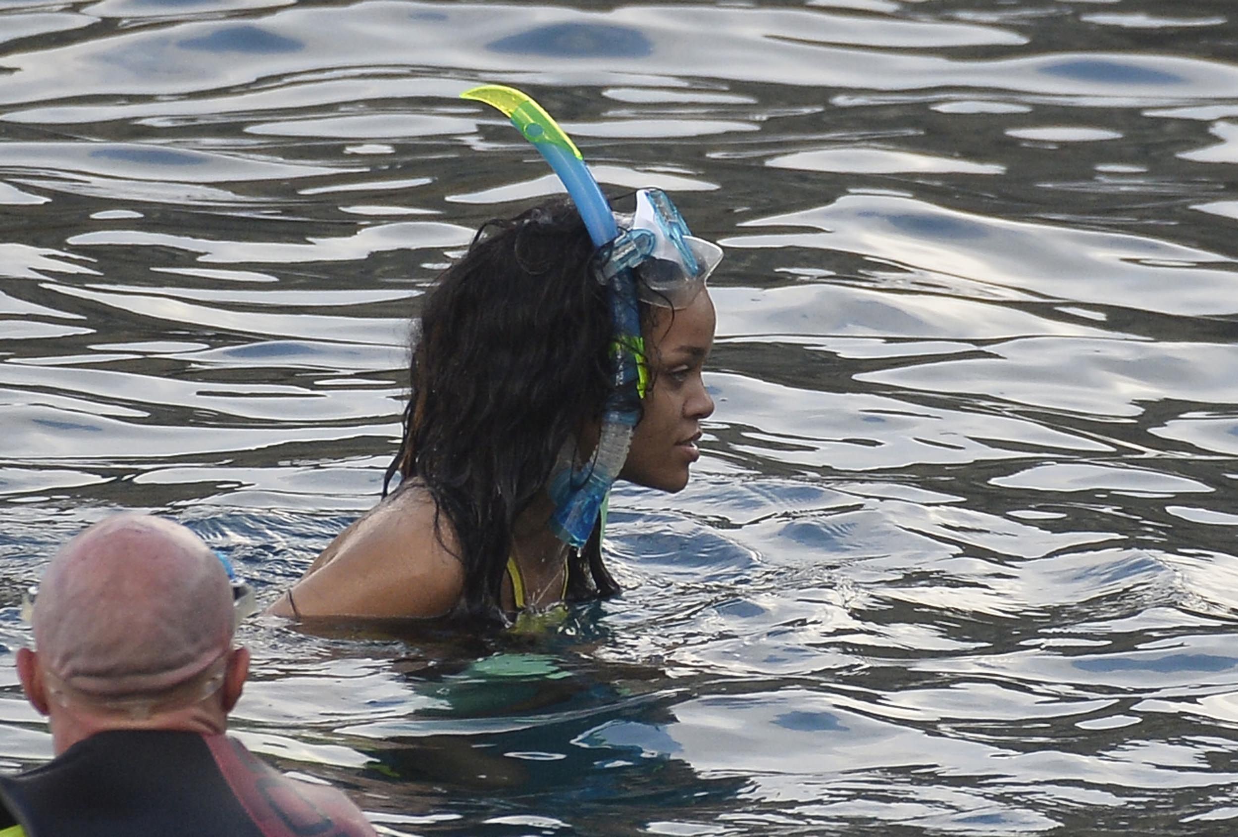 Rihanna enjoying a break on a yacht in Ponza August 29, 2014