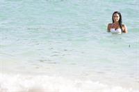 Tulisa Contostavlos in a bikini on the beach in Bermuda August 21, 2014