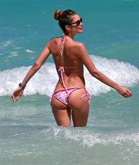 Doutzen Kroes enjoys a day on the beach in Miami Beach, FL on April 28, 2013