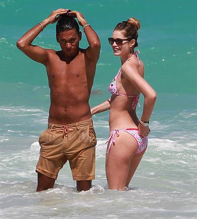 Doutzen Kroes enjoys a day on the beach in Miami Beach, FL on April 28, 2013