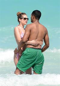 Doutzen Kroes enjoys a day on the beach in Miami Beach, FL on April 28, 2013