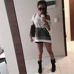 Anitta taking a selfie