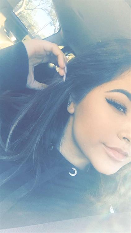 Becky G taking a selfie
