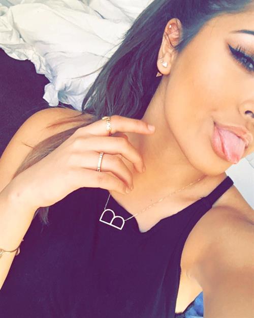 Becky G taking a selfie