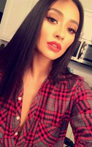 Shay Mitchell taking a selfie
