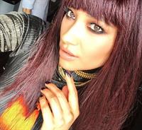 Shay Mitchell taking a selfie