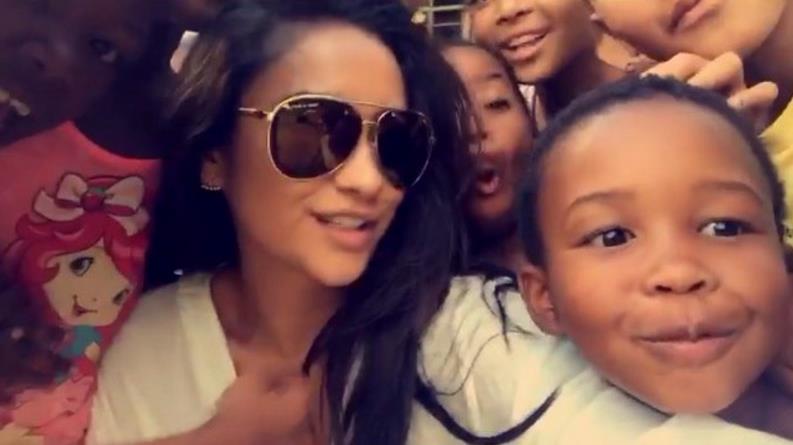 Shay Mitchell taking a selfie