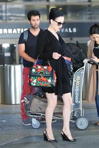 Dita Von Teese arrives from a flight at LAX August 20, 2014