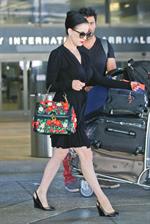 Dita Von Teese arrives from a flight at LAX August 20, 2014