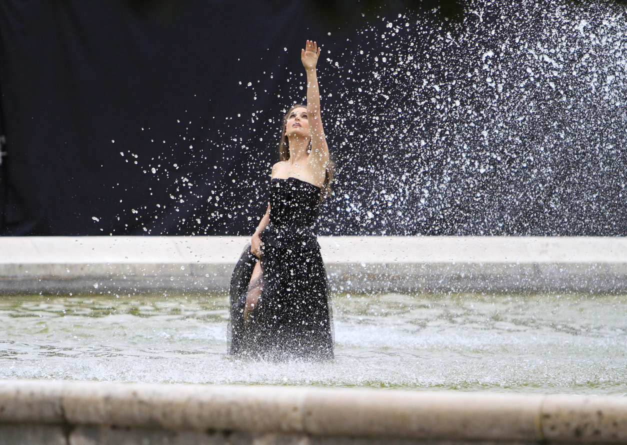 Natalie Portman Pictures Natalie Portman modeling for a Miss Dior campaign photo shoot in the gardens of the Palais Royal in Paris 6/26/12