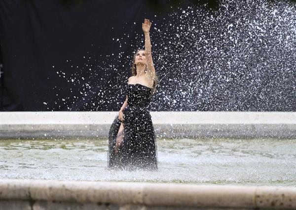 Natalie Portman modeling for a Miss Dior campaign photo shoot in the gardens of the Palais Royal in Paris 6/26/12 