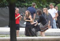 Natalie Portman modeling for a Miss Dior campaign photo shoot in the gardens of the Palais Royal in Paris 6/26/12 