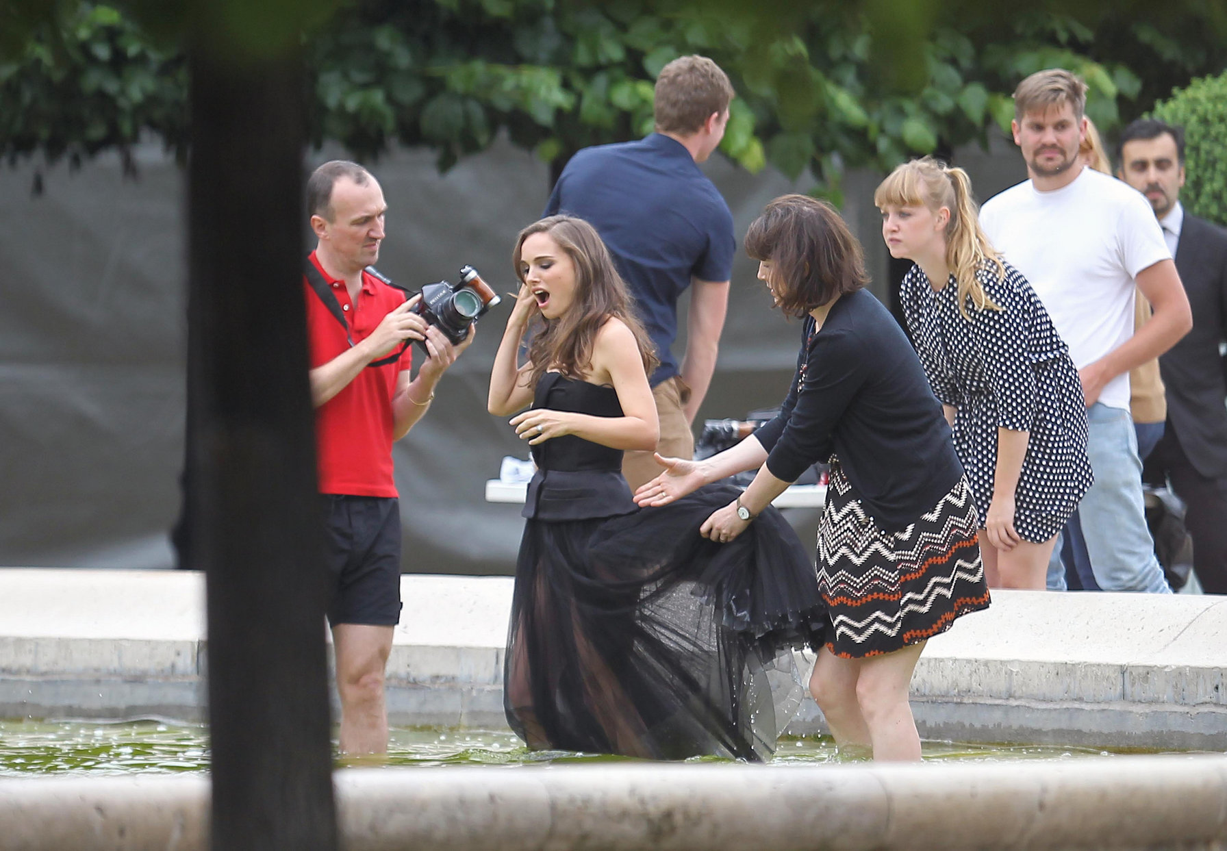 Natalie Portman modeling for a Miss Dior campaign photo shoot in the gardens of the Palais Royal in Paris 6/26/12 