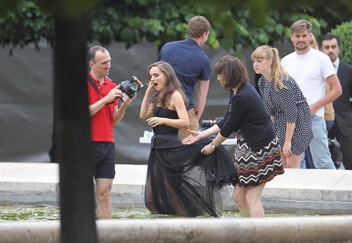Natalie Portman modeling for a Miss Dior campaign photo shoot in the gardens of the Palais Royal in Paris 6/26/12 
