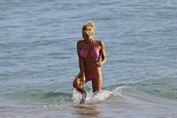 Pamela Anderson Wearing bikini on the beach in Hawaii - August 8, 2013 
