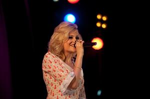 Pixie Lott performs on stage in Londonderry, Northern Ireland, Thursday, June 21, 2012.