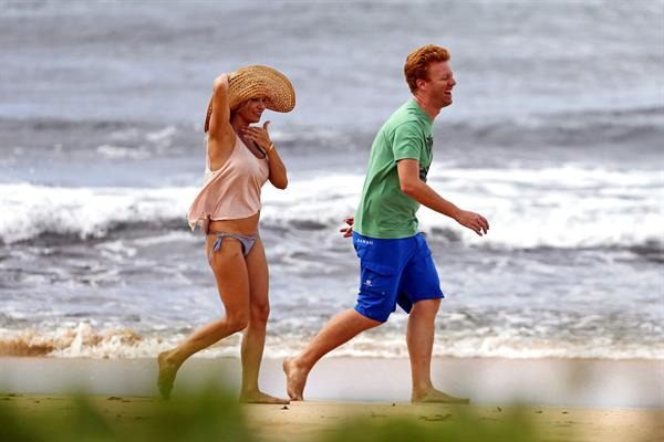 Pamela Anderson Takes a walk in bikini bottoms on the Island of Maui December 30, 2012 