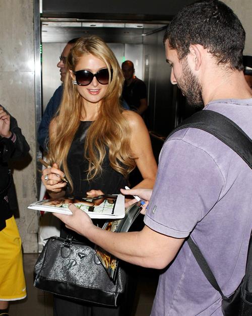 Paris Hilton arrive at LAX Airport 9/30/13