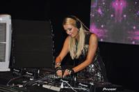 Paris Hilton walks for designer duo Shane and Falguni Peacock and performs as a DJ at the India Resort Fashion Week