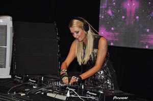 Paris Hilton walks for designer duo Shane and Falguni Peacock and performs as a DJ at the India Resort Fashion Week