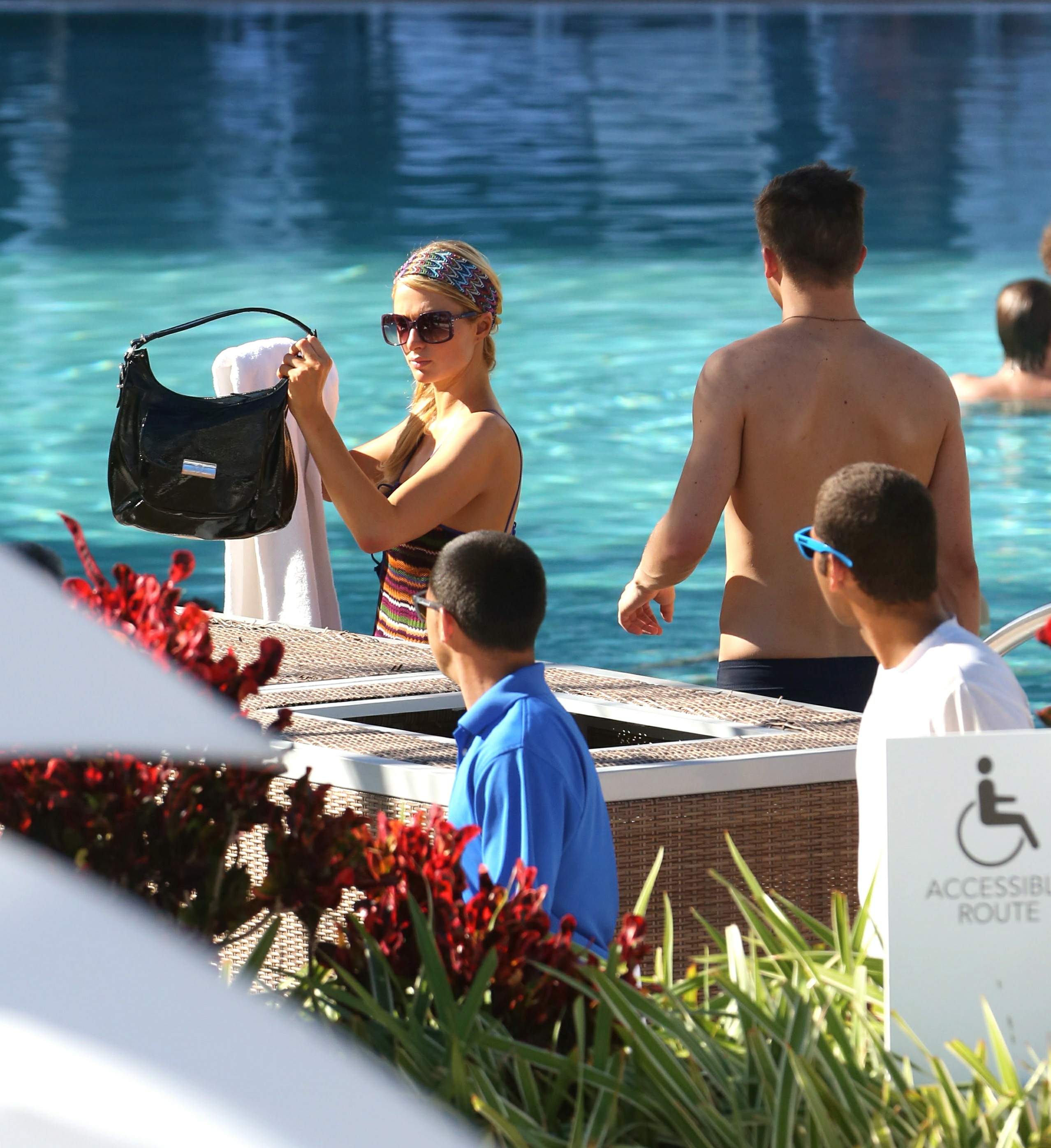 Paris Hilton poolside at their Miami hotel December 7-2012 