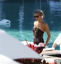 Paris Hilton poolside at their Miami hotel December 7-2012 