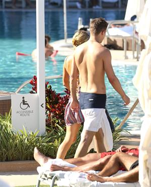 Paris Hilton poolside at their Miami hotel December 7-2012 