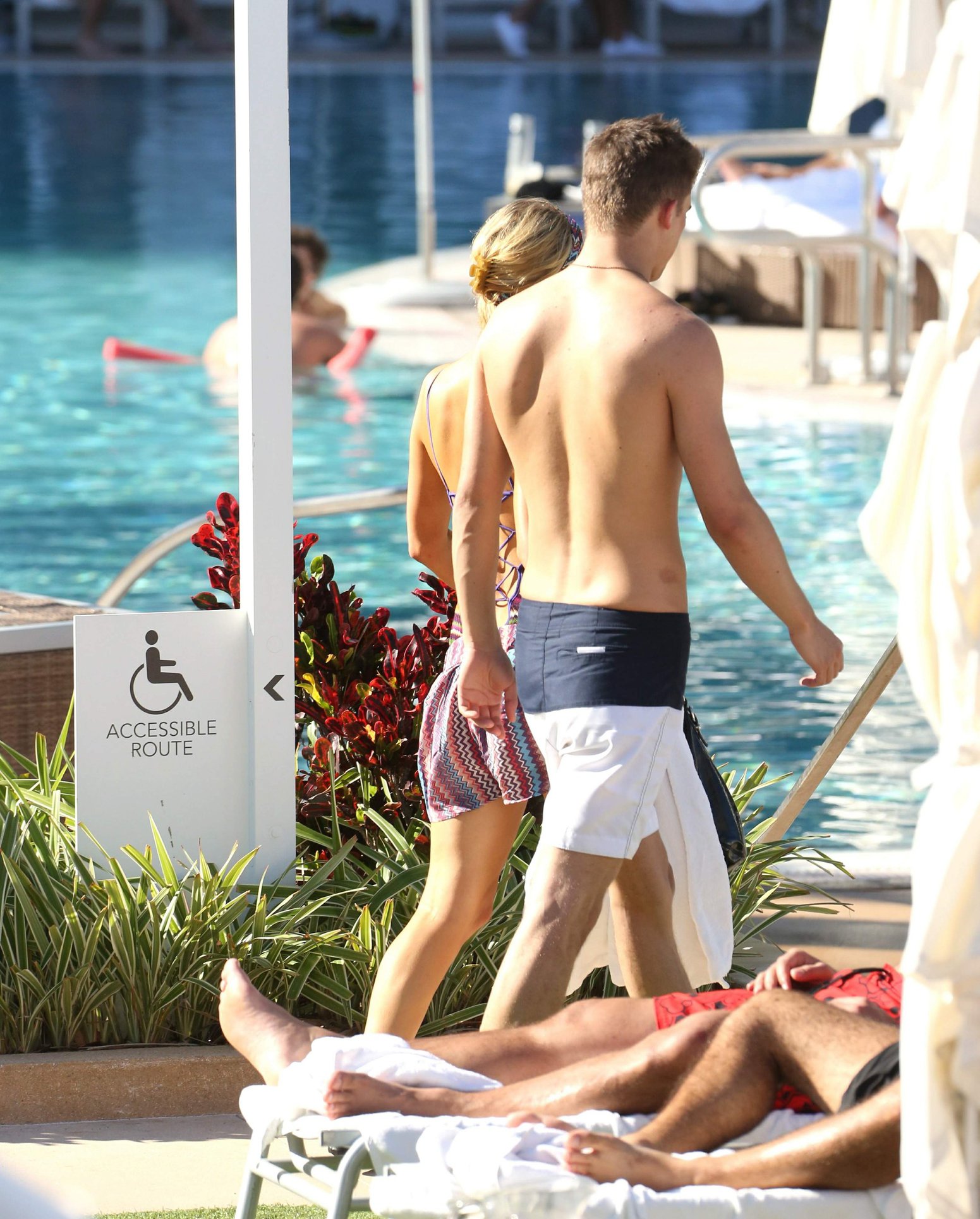 Paris Hilton poolside at their Miami hotel December 7-2012 