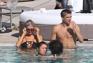 Paris Hilton poolside at their Miami hotel December 7-2012 